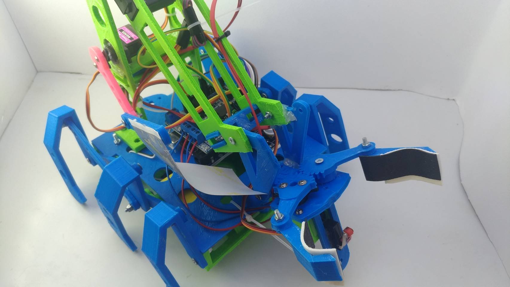 หุ่นยนต์อัตโนมัติ แบบขาเดิน ยกกระป๋องสูง 30 เซ็นติเมตร Ex