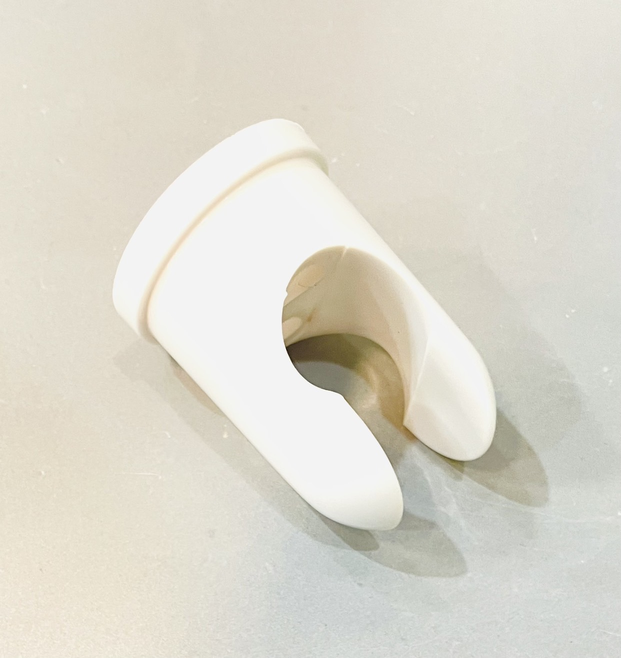 ขาแขวนสายฝักบัว สีขาว