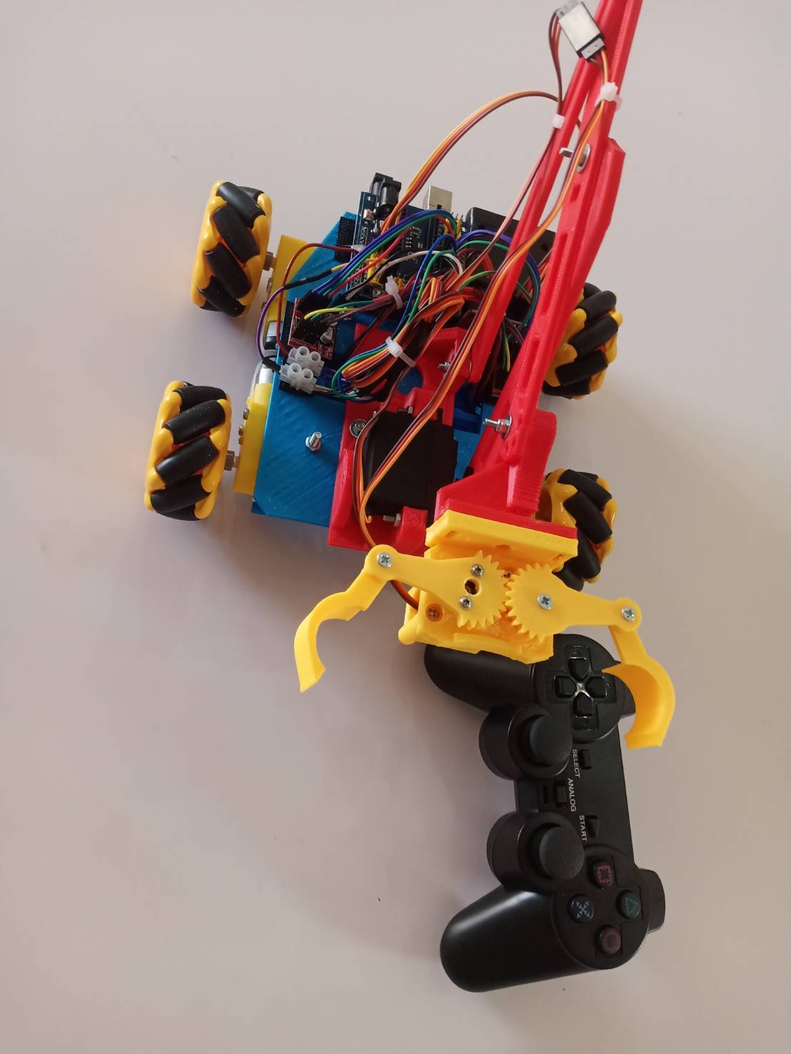 หุ่นยนต์บังคับแบบผสม สพฐ.แบบล้อสไลด์ข้างได้(ประกอบเสร็จ) Ex