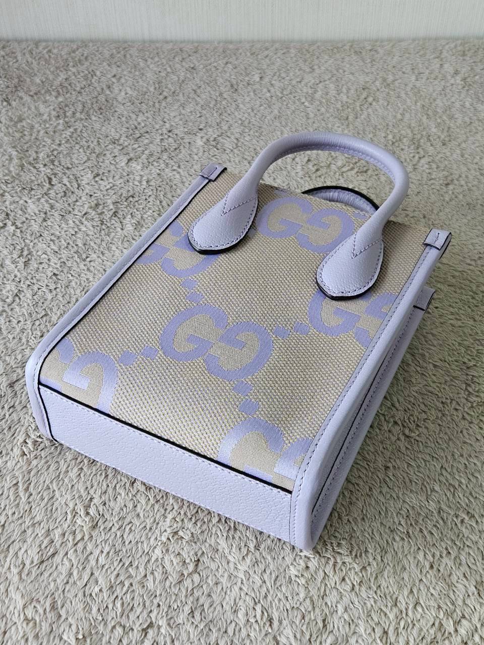 Gucci Jumbo GG Canvas Vertical Mini Tote