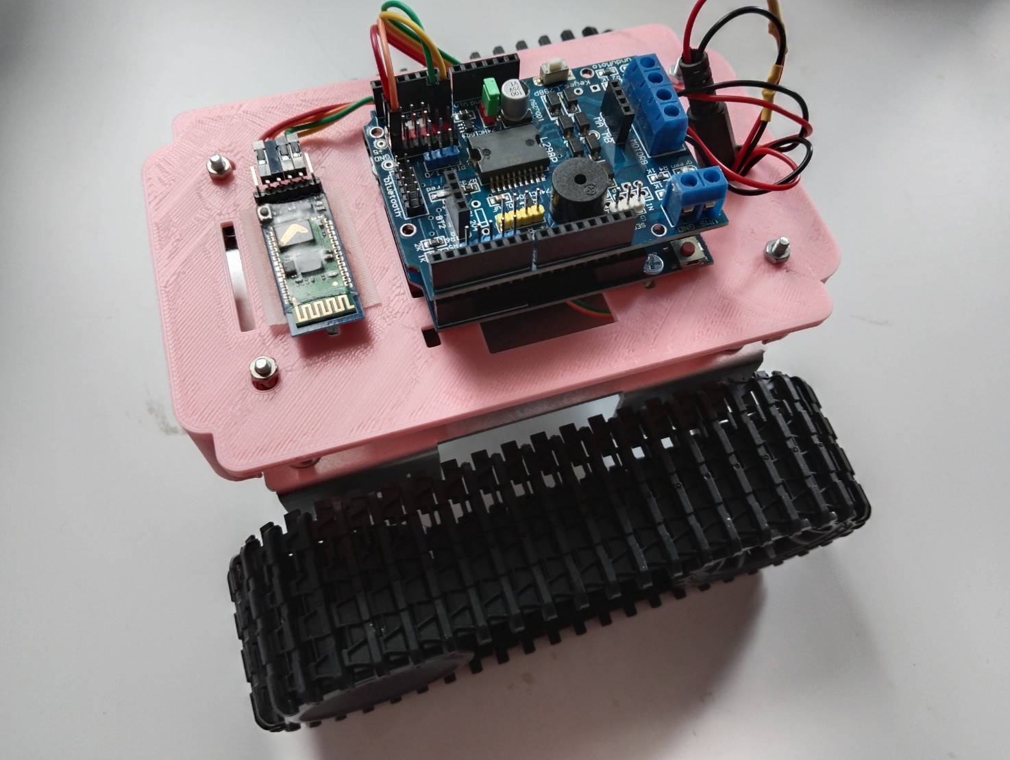 หุ่นยนต์บังคับผ่านแอพพลิเคชั่น รุ่นสายพาน Ex