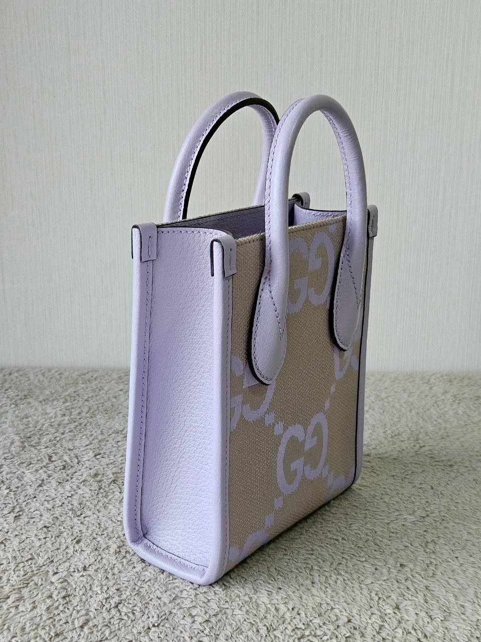 Gucci Jumbo GG Canvas Vertical Mini Tote