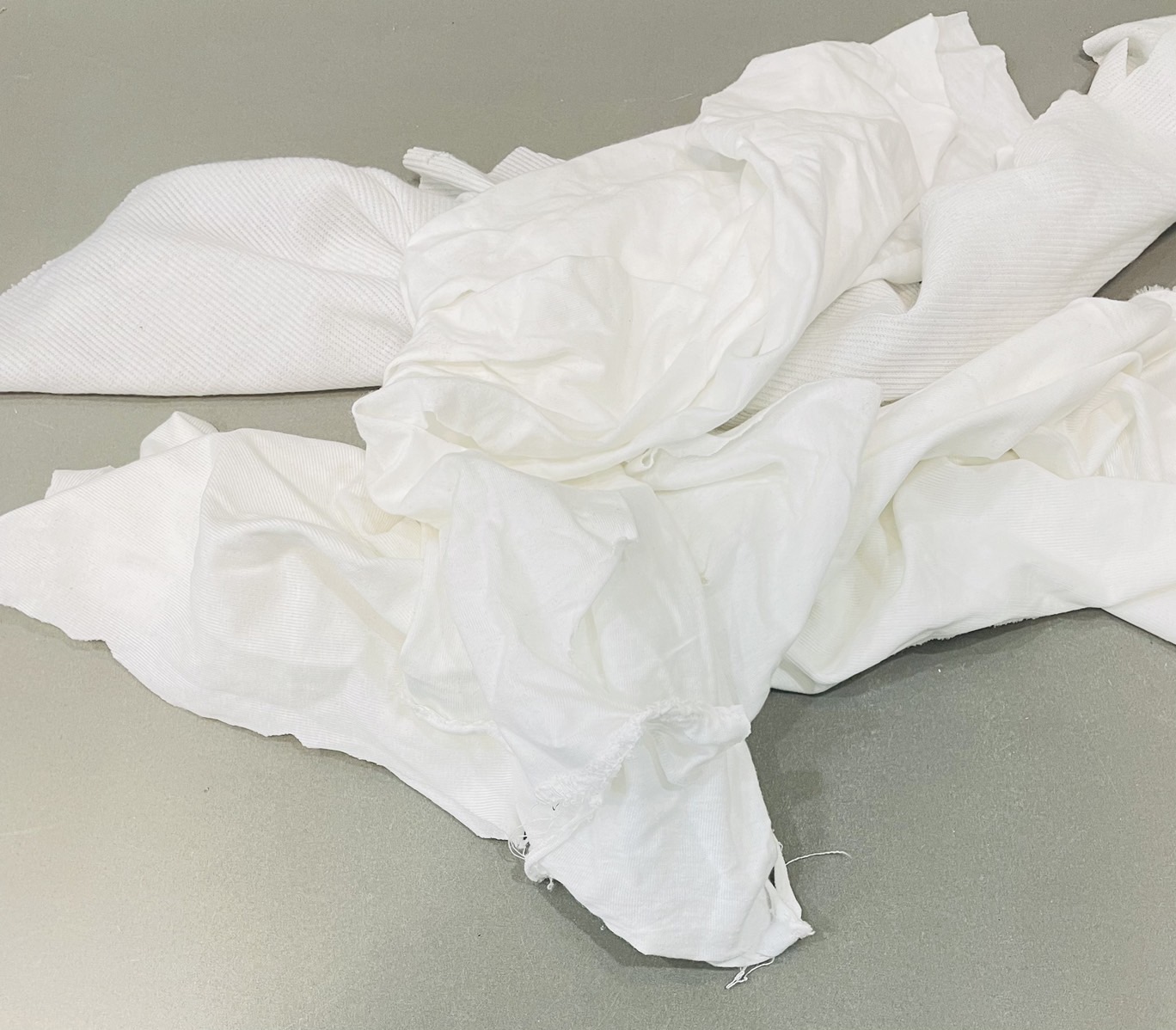 เศษผ้าสีขาว ไม่เย็บ (ถุง 0.5กก.)