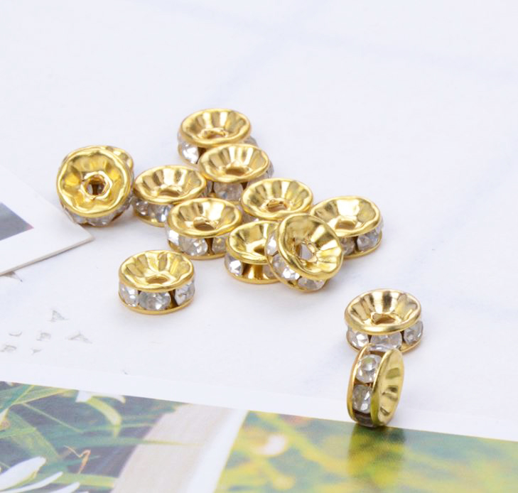 ขายส่ง ตัวแต่งคั่นเพชร สีขาว ขอบทอง 6มิล บรรจุ 100ชิ้น