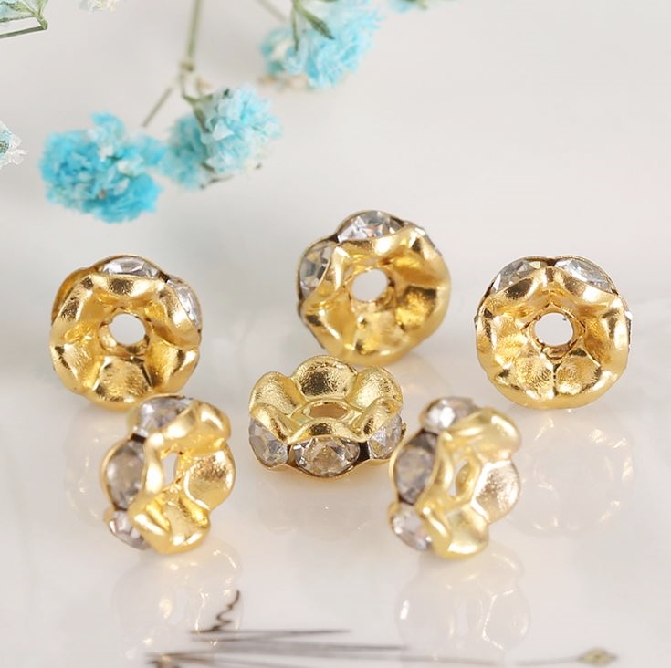 ขายส่ง ตัวแต่งคั่นเพชร สีขาว ขอบทอง รุ่นใหม่ รุ่น Wave gold 8มิล บรรจุ 100ชิ้น