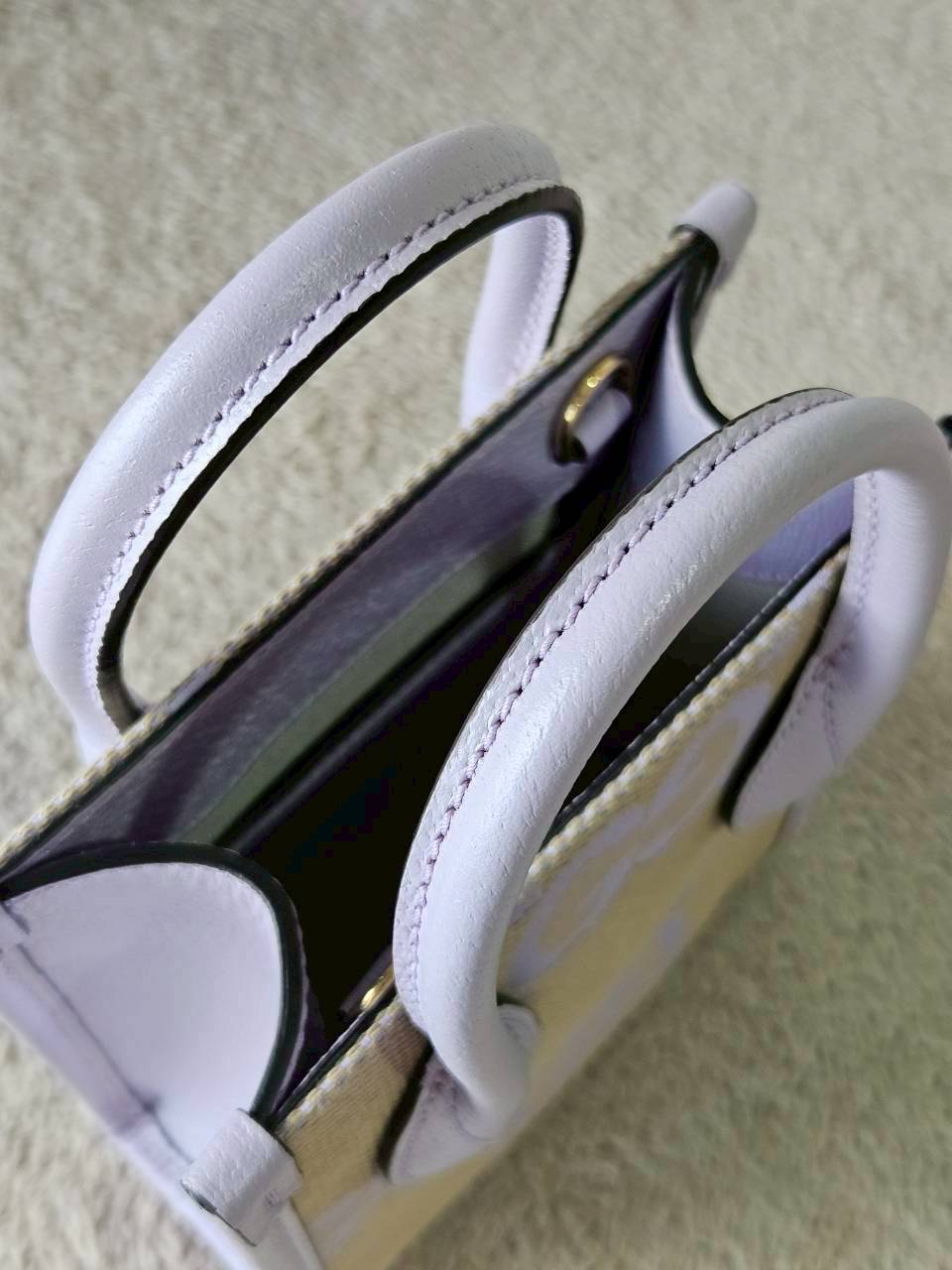 Gucci Jumbo GG Canvas Vertical Mini Tote