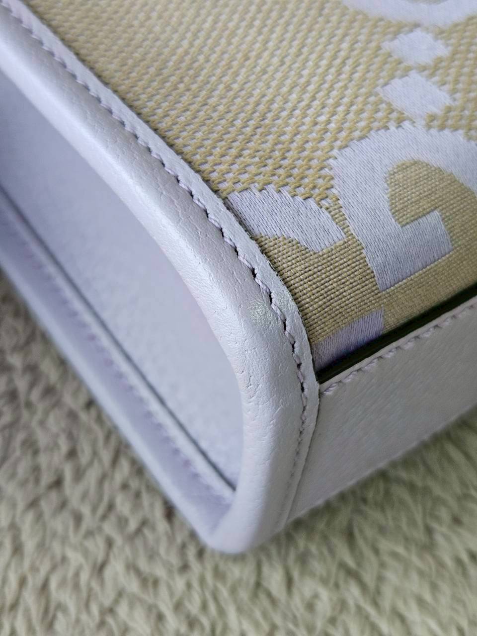 Gucci Jumbo GG Canvas Vertical Mini Tote