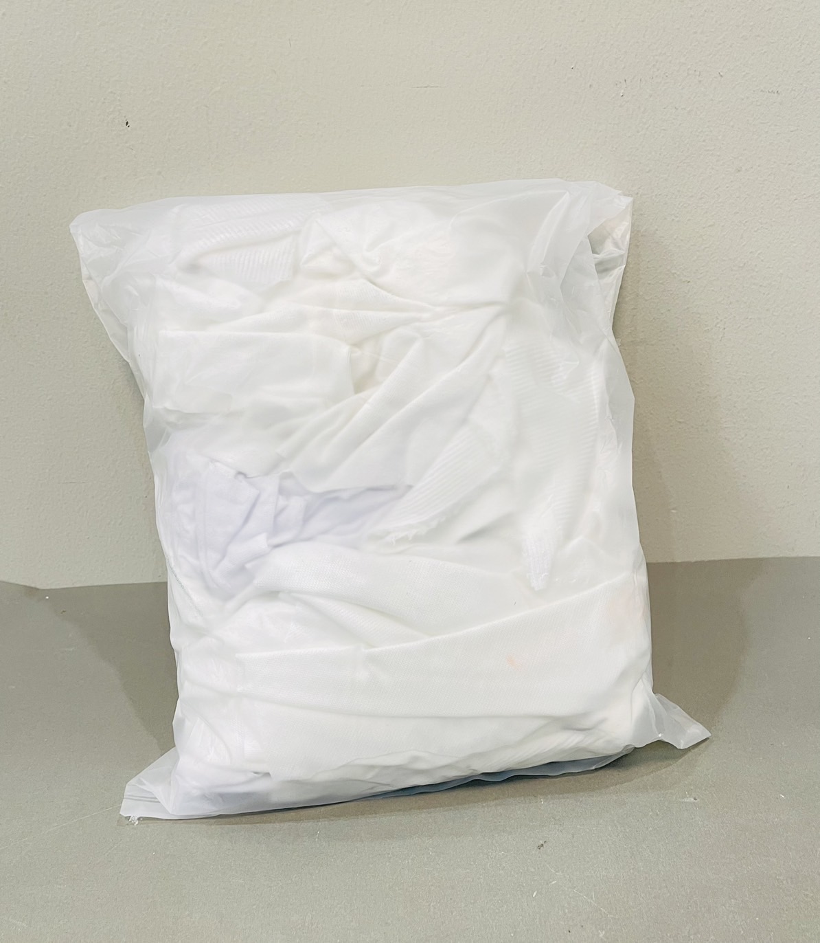 เศษผ้าสีขาว ไม่เย็บ (ถุง 0.5กก.)