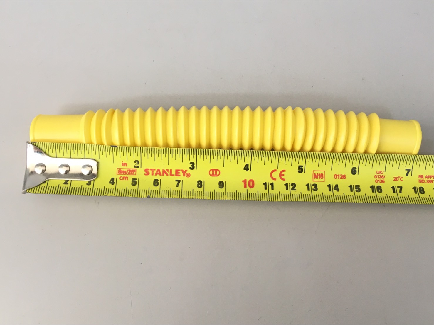 ข้อต่อท่อย่นเหลือง 18cm.