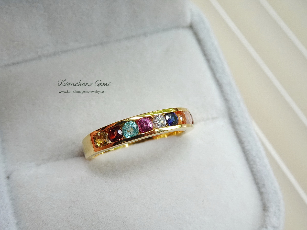 แหวนพลอยนพเก้า แหวนแถวฝังพลอย 9 ชนิด ตัวเรือนทอง 90% เพชรแท้ขนาด 0.05 กระรัต และพลอยแท้ตรงตามตำราโบราณ เพื่อความเป็นสิริมงคลสูงสุด