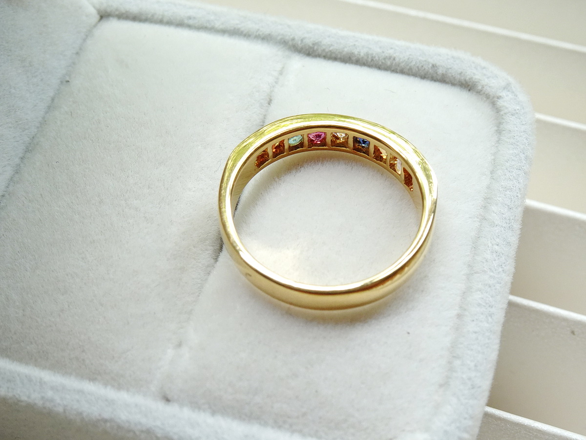 แหวนพลอยนพเก้า แหวนแถวฝังพลอย 9 ชนิด ตัวเรือนทอง 90% เพชรแท้ขนาด 0.05 กระรัต และพลอยแท้ตรงตามตำราโบราณ เพื่อความเป็นสิริมงคลสูงสุด