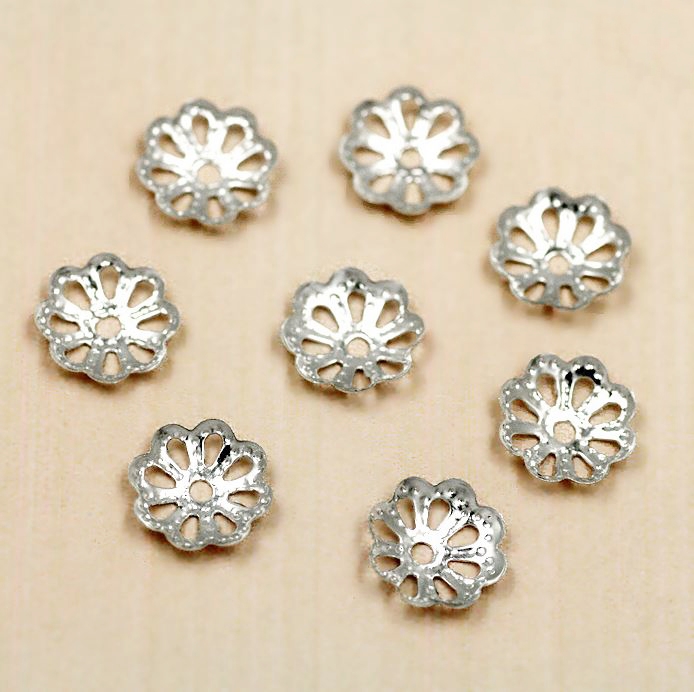 ขายส่ง ฝาครอบดอกไม้ สีเงิน ขนาด 9มิล (บรรจุ 200ชิ้น)