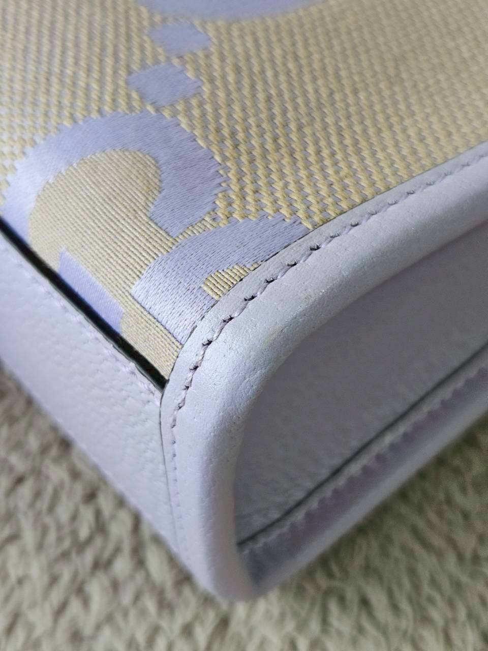 Gucci Jumbo GG Canvas Vertical Mini Tote