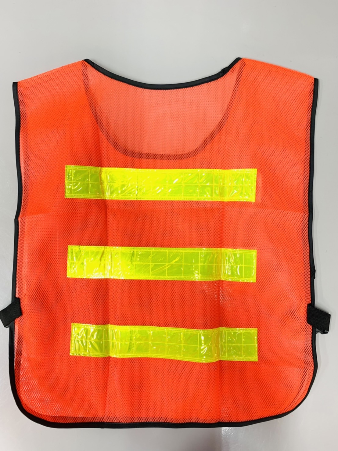 เสื้อจราจรสะท้อนแสง สีส้ม