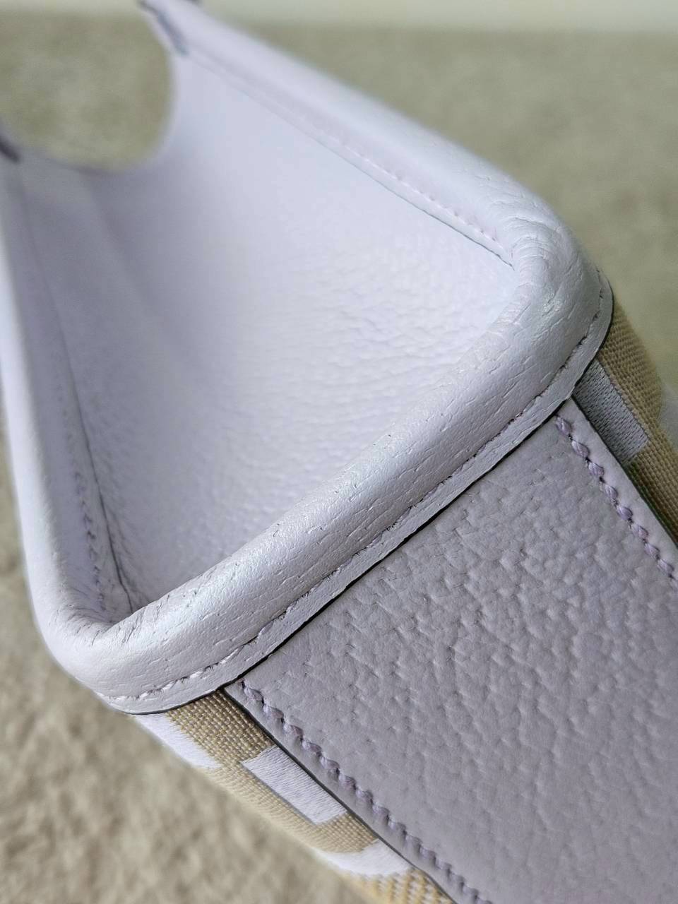 Gucci Jumbo GG Canvas Vertical Mini Tote