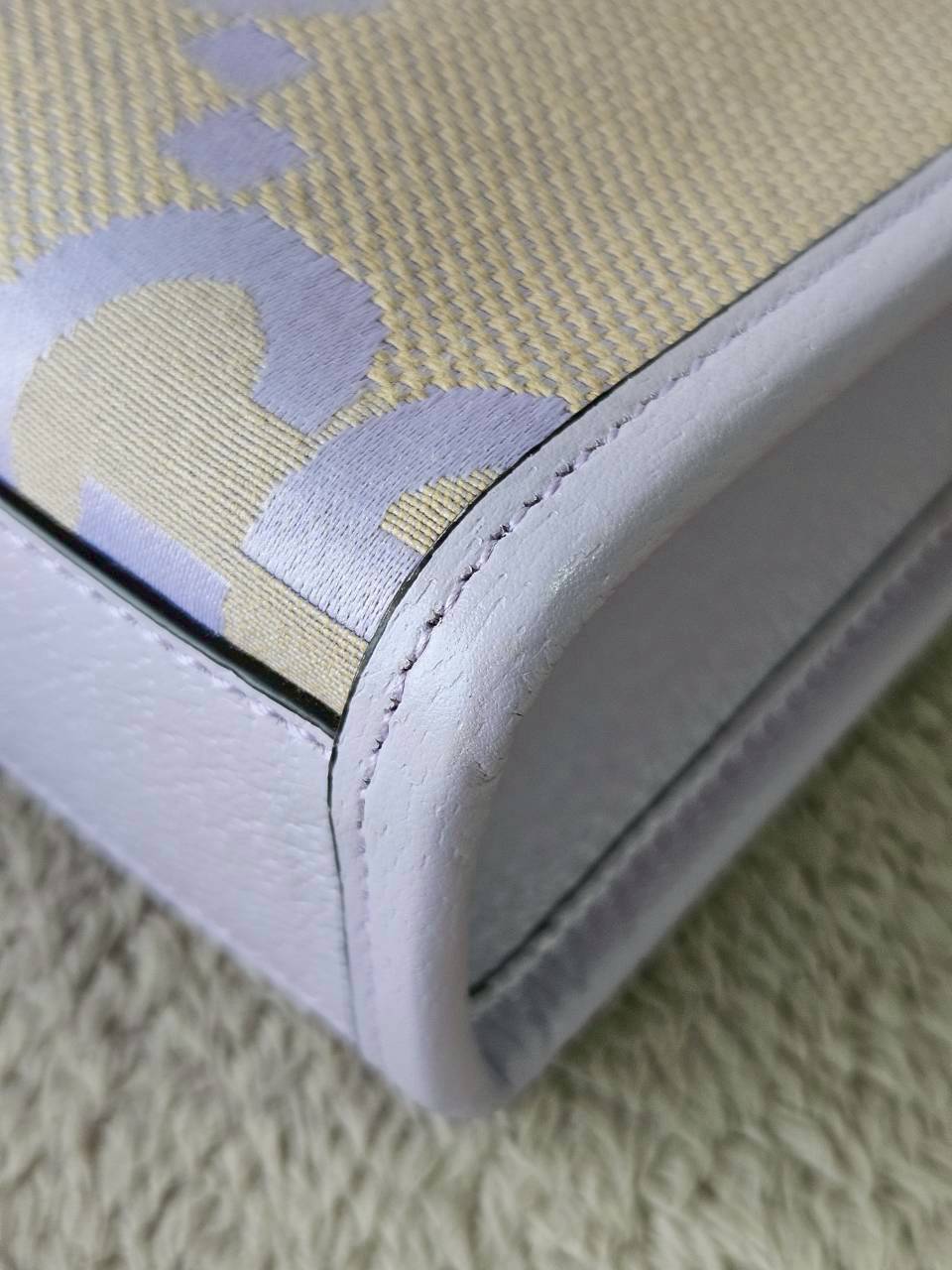 Gucci Jumbo GG Canvas Vertical Mini Tote