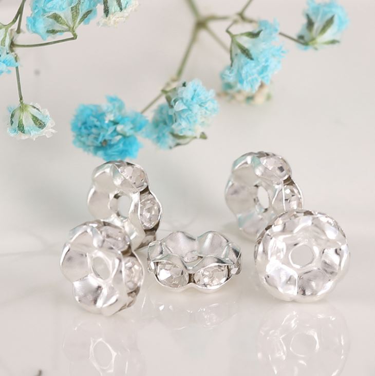 ขายส่ง ตัวแต่งคั่นเพชร สีขาว ขอบเงิน รุ่นใหม่ รุ่น Wave Silver 10มิล บรรจุ 100ชิ้น