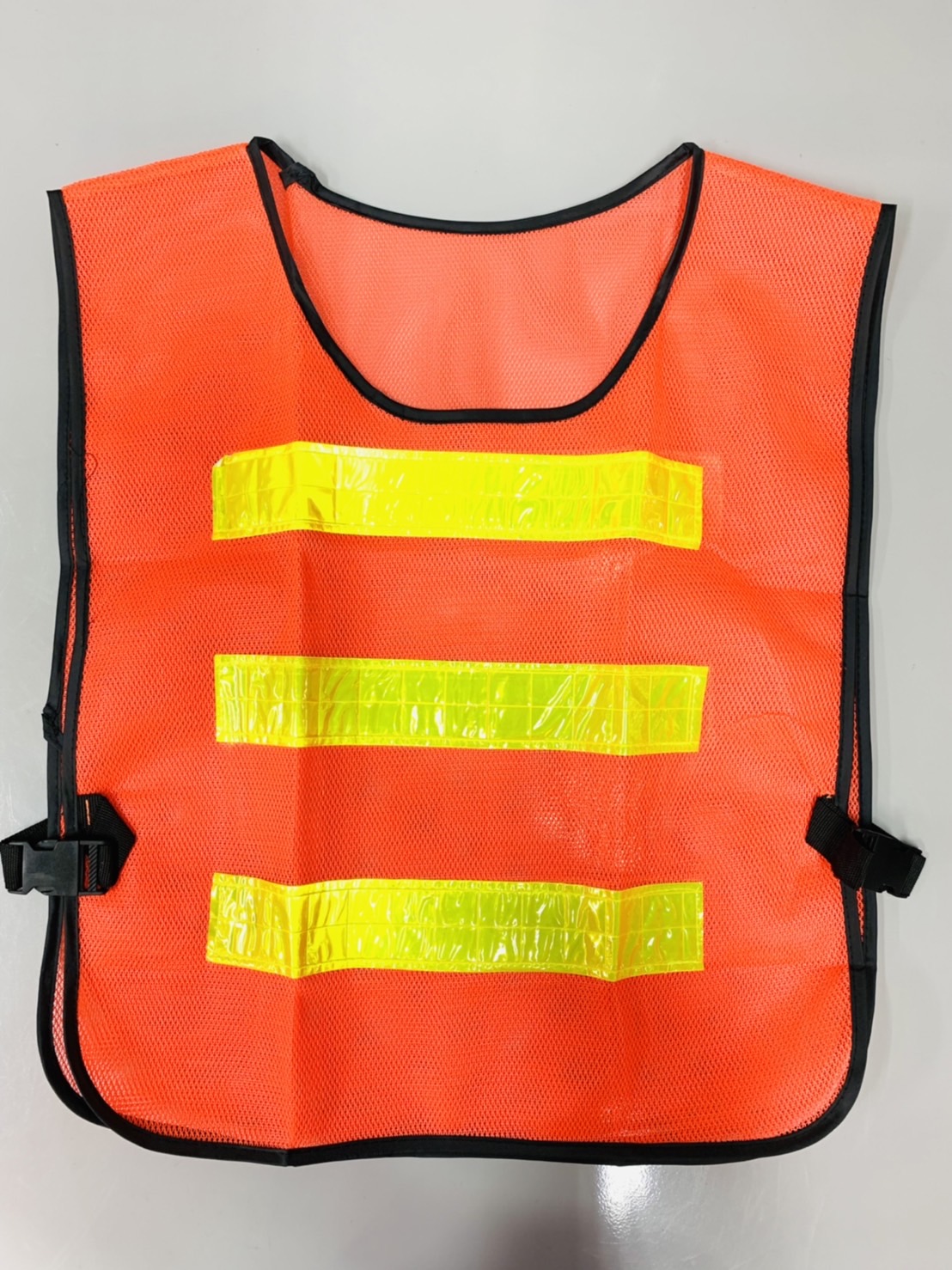 เสื้อจราจรสะท้อนแสง สีส้ม