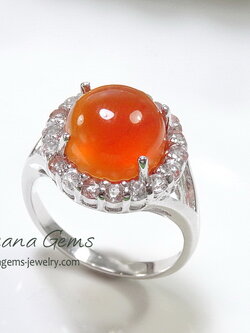 แหวนคนเกิดวันพฤหัส แหวนพลอยโมราหลังเบี้ยสีส้ม ล้อมพลอยขาวตัวเรือนเงินแท้ ชุบทองคำขาว ชิ้นงานคุณภาพ ประณีตสุดๆ รับประกันความพึงพอใจ