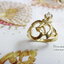 แหวน "โอม" สีทองสำหรับผู้บูชาองค์พระพิฆเนศ ตัวเรือนเงินแท้ ฝังเพทาย zircon “โอม” เป็นสัญลักษณ์ประจำองค์พระพิฆเนศ มหาเทพแห่งความสำเร็จและเป็นองค์บรมครูแห่งศิลปวิทยาการถึง 18 ประการ