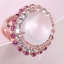 แหวนพลอยชมพูโรสควอทซ์หลังเบี้ยล้อมพลอยขาว white topaz และทับทิมสีชมพูเข้ม สวยหวาน ชุบพิงค์โกลด์ ตัวเรือนเงินแท้